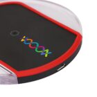 A wireless charging pad with a transparent outer edge and red trim. The center is black with a colorful logo featuring overlapping X shapes. A micro USB port is visible on the side.