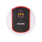 A round, clear object with a black and red center. The center features a logo with a toy mobile, stars, and the text BABY SHOP Toys & Accessory in purple and yellow. KROWE is printed below in white.