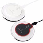Two round wireless chargers are shown. One is black with a red rim, and the other is white with a translucent rim. Both have the word FANTASY on them and are plugged in with USB cables.