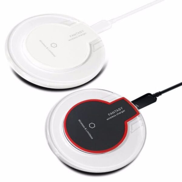 Two circular wireless chargers, one with a white and clear design and the other with a black and red design. Both chargers are branded with the word FANTASY and are connected by USB cables.