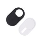 Two webcam covers are shown, one black and one white, with sliding mechanisms to cover or expose a camera lens. The covers are oval-shaped and designed to be attached to devices for privacy protection.