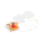 Clear star-shaped containers filled with colorful candies, featuring keychain attachments. One container is open, revealing assorted sweets inside, while the others are closed. They lie on a white background.