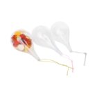 Three clear, teardrop-shaped balloons with strings attached. The left balloon is filled with colorful gummies, while the two on the right are empty.