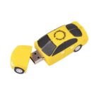 Yellow car-shaped USB flash drive with the front section detached, revealing the USB connector. The car features black and white details, with text on the roof.