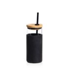 A clear glass tumbler with a black silicone sleeve, featuring a wooden lid and a black straw, is set against a plain white background.