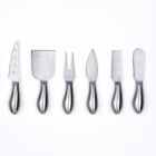 A set of six stainless steel cheese tools neatly arranged on a white background, including a cheese knife with holes, a flat cheese cutter, a cheese fork, a plane knife, a chisel knife, and a spreader.
