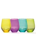 Four colorful glass tumblers are displayed in a row against a white background. The glasses are yellow, purple, blue, and green, each having a rounded shape and smooth surface.