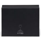 A sleek black box with minimalist design features a line drawing of a wine glass at the center. Below, text reads po di fame with additional details: 550ml / 18.5 oz, 2x Ginsacoes Gin Glasses and little hungry.