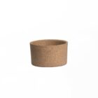 A simple, cylindrical cork planter with a smooth texture against a plain white background.