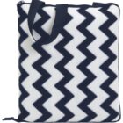 A tote bag with a black and white zigzag pattern. The bag has a zippered top and two black handles.