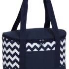 A soft-sided cooler bag with a black and white zigzag pattern and solid black straps sits on a white background. The bag has a black zippered top and a rectangular front pocket.