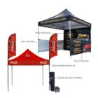 A product image showing a customizable outdoor tent with back, left, and right side rails, a tent banner mount kit, and a travel bag with wheels. The tent displays automotive branding and Coca-Cola logos on separate sections.