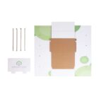 Cardboard box partially assembled, flat on a white background. Includes four zip ties, a white envelope with a logo and CORPORATE NAME text, and the box has green circle patterns on the inside.