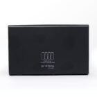 A sleek black box labeled po di fame with an outline of four champagne flutes and additional specifications about the product. The design is minimalistic with white and gray text.