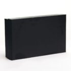 A plain, rectangular black box with a matte finish is displayed against a white background. The box has no visible markings or text.
