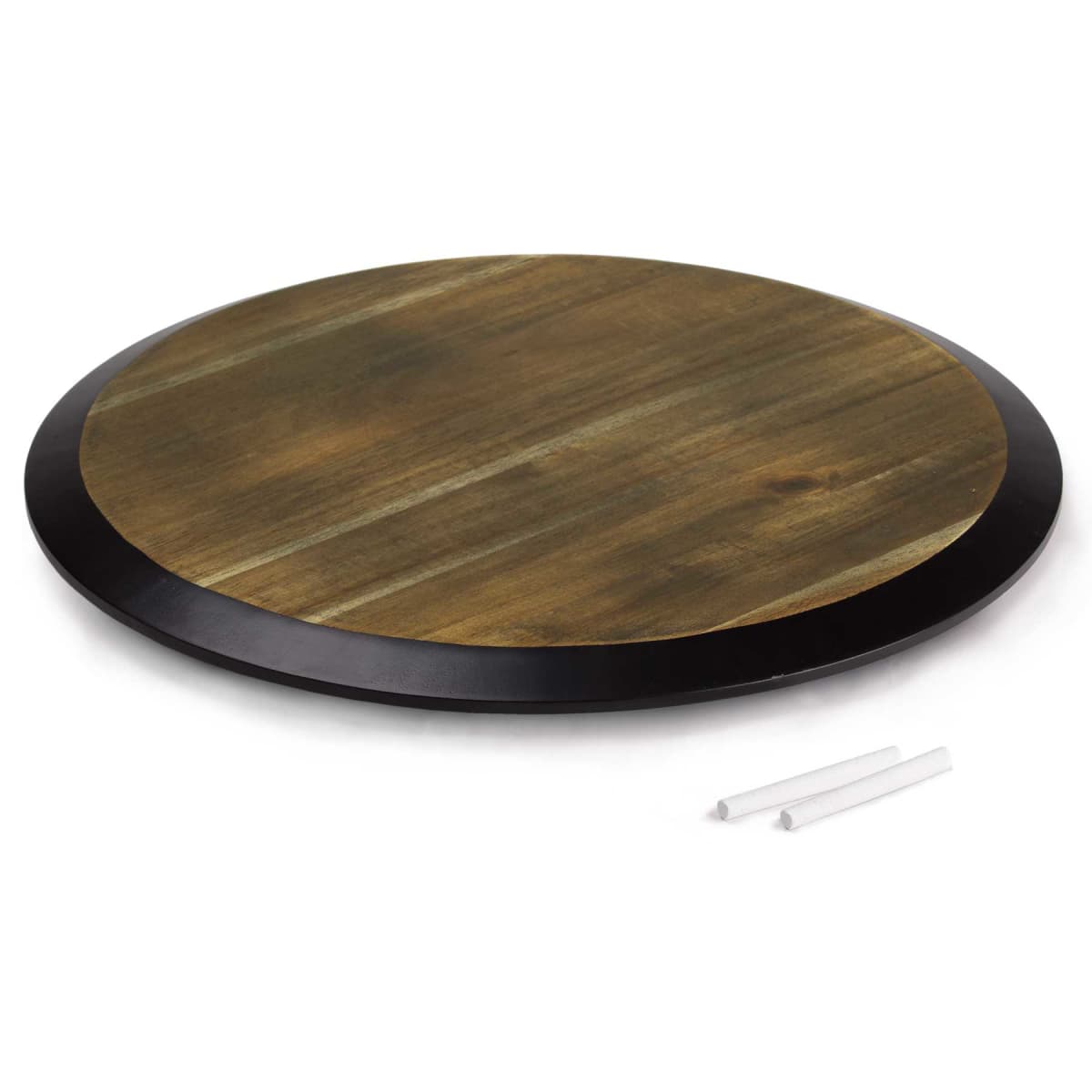 A round wooden board with a black edge, accompanied by two pieces of white chalk, lying on a white background.