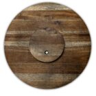 A round wooden pedestal stand with a smaller, raised circular platform in the center. The wood features varying shades of brown, showcasing distinct natural grain patterns.