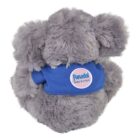 A plush grey elephant toy wearing a blue shirt with a round logo on the back. The logo reads Panadol Baby & Infant. The toys ears are large and fluffy.