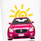 A clear bottle with a pink cap featuring a bright pink car and a yellow sun illustration. The words Westside Auto are written at the bottom.