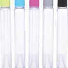Five clear cylindrical vials in a row, each with a different colored cap: yellow, blue, pink, gray, and black. The vials are empty and standing upright.