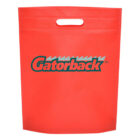 A red reusable tote bag with a cut-out handle, featuring the word Gatorback in stylized green and white letters on the front.