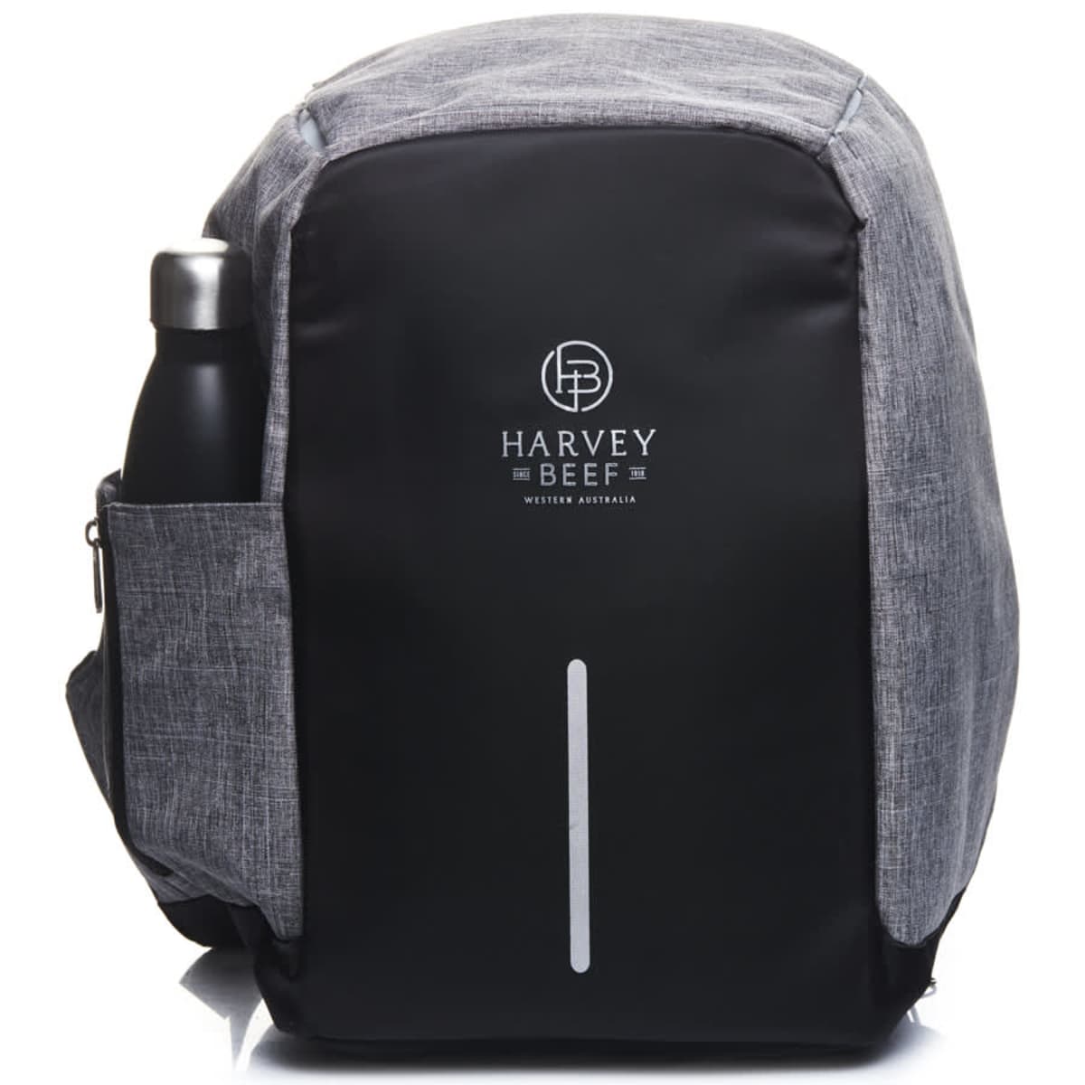 A sleek gray and black backpack with a side pocket holding a bottle. The front features a Harvey Beef Western Australia logo, and a reflective vertical stripe is centered on the black section. The backpack appears modern and stylish.