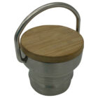 A stainless steel and bamboo vacuum bottle lid with a curved metal handle. The bamboo top provides a natural look, contrasting with the metallic finish. The design is both functional and stylish.