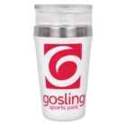 A white travel tumbler with a clear lid featuring a red logo and the text gosling sports park in red. The tumbler has a metallic band near the lid.