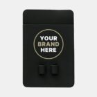 Black product packaging displaying two small items at the bottom. A round area in the center has the text YOUR BRAND HERE, suggesting customizable branding. Simple, minimalist design on a light gray background.