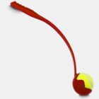 A red plastic ball launcher with an ergonomic handle holding a yellow tennis ball with red accents, depicted on a plain white background.