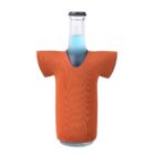 A glass bottle with blue liquid, wrapped in an orange neoprene sleeve shaped like a T-shirt, with the cap exposed.