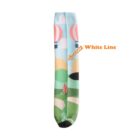Colorful socks featuring a landscape design with hot air balloons in the sky, rolling hills, and paths. An arrow points to a White Line near the top of the sock.
