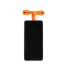 A black smartphone with an orange, basketball-themed mini fan attached at the top. The fan is labeled BASKETBALL on each blade.
