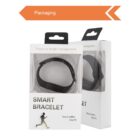 Two boxes of a Smart Bracelet with the product visible inside. The packaging is white with text: Focus on health management and Stay healthy, Stay fit. An orange arrow with Packaging points to the boxes.