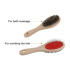 Two wooden brushes are displayed. The top brush has black bristles, labeled for bath massage. The bottom brush has metal bristles on a red base, labeled for combing hair. Both have holes in their handles.