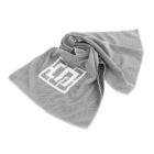 Gray microfiber towel with a rectangular logo in the center, featuring geometric shapes. The towel appears textured and is casually draped with soft folds.