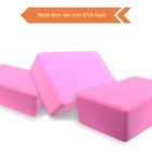 Three pink yoga blocks made from non-toxic EVA foam are arranged against a white background. An orange label in the top left corner reads, Made from non toxic EVA foam.