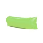 A bright green inflatable lounger with a sleek, cylindrical design, resting against a white background.