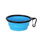 Collapsible blue silicone bowl with a black rim and a carabiner clip attached, designed for portable use.