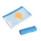 Folded and rolled-up blue microfiber towels. The folded towel has a printed design featuring an orange sun and white clouds against a light blue background. The rolled towel is plain blue.