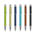 Six pens with woven texture grips in different colors: lime green, beige, navy blue, light blue, brown, and black. Each pen has a silver tip and clip, arranged vertically against a white background.