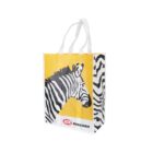 A reusable shopping bag with a zebra design on a yellow background. The bag features the logo IGA Runcorn at the bottom. The sides of the bag display zebra stripes. The handles are white.