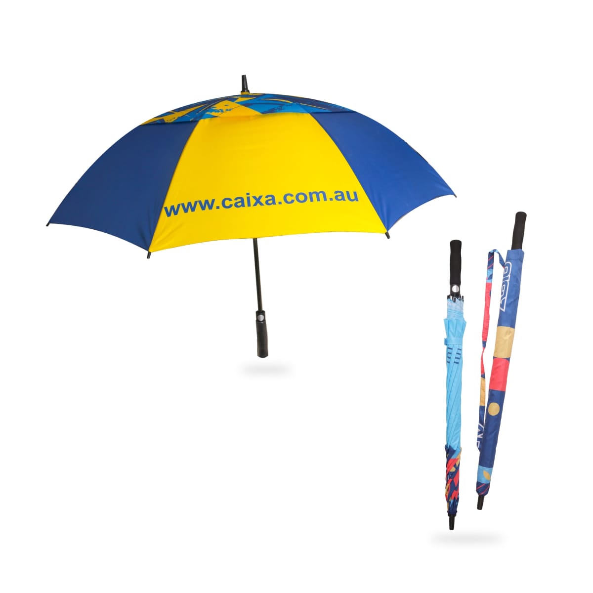A large umbrella with alternating blue and yellow panels, featuring the URL www.caixa.com.au in blue text. Two folded umbrellas with colorful patterns are shown alongside, each with a black handle.