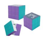Three colorful cubes with purple and teal squares. One cube is fully aligned while another is mid-twist. The top of one cube displays 2021 in white text. The design resembles a puzzle toy.
