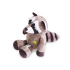 A plush raccoon toy sits upright with soft brown and white fur, distinct black markings around its eyes, and a striped tail. The toy has embroidered features and a small yellow logo on its belly.