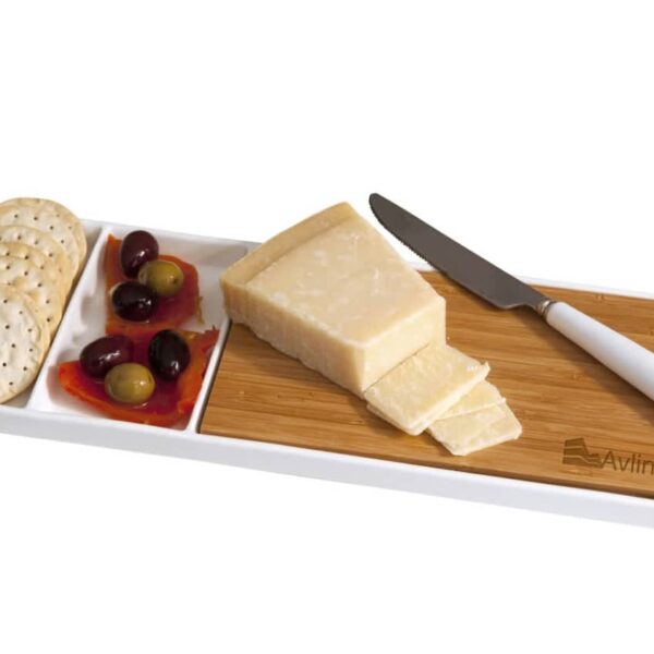 A rectangular serving platter with a bamboo section holding a knife and sliced cheese. Next to it, a section with crackers, olives, and sliced red peppers. The platter has an inscription that reads Aviline.