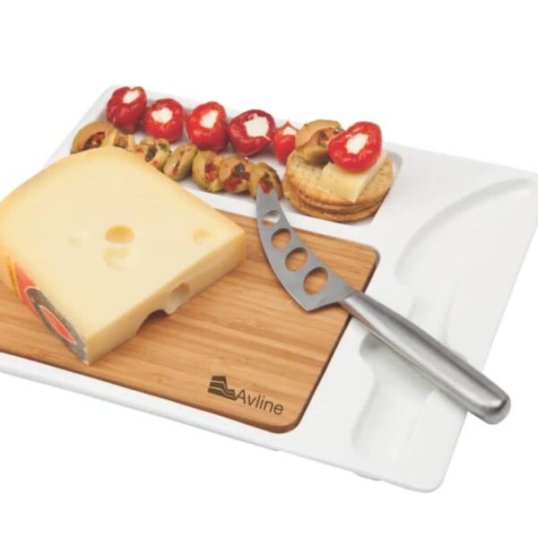 A cheese platter with a wedge of cheese, a cheese knife, and appetizers including stuffed cherry tomatoes and cheese-topped crackers on a wooden board with a plastic base.