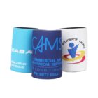 Three colorful stubby holders with company logos and contact information. One is blue with white text, another is navy with bold blue and white text, and the third is white with a vibrant logo and text.