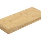 A rectangular bamboo cutting board with a smooth surface and natural wood grain. The board is placed on a white background, highlighting its minimalist design.