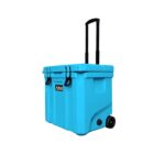 A bright blue, hard-shell cooler with black wheels and an extendable handle. It features sturdy latches and a logo on the front. The design emphasizes portability and durability.